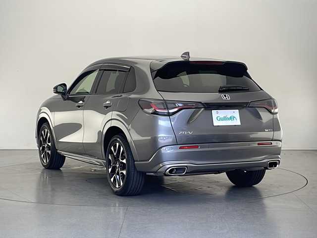 ホンダ ＺＲ－Ｖ ハイブリッド e:HEV Z 長野県 2023(令5)年 1.4万km スーパープラチナグレーメタリック 4WD/ホンダセンシング/純正メモリナビ/Bluetooth/フルセグTV/全方位カメラ/ETC2.0/ステアリングヒーター/パワーシート（運転席、助手席）/シートメモリ/シートヒーター（運転席、助手席）/BOSEサウンド/置くだけ充電/衝突被害軽減システム/踏み間違い衝突被害軽減/レーンキープアシスト/横滑り防止装置/路外逸脱抑制機能/フロントロアスカート/サイドロアスカート/テールゲートスポイラー/ステアリングスイッチ/パドルシフト/純正18インチAW装着/社外フロアマット/ドアバイザー/LEDヘッドライト/前後コーナーセンサー/スマートキー