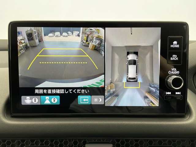 ホンダ ＺＲ－Ｖ ハイブリッド e:HEV Z 長野県 2023(令5)年 1.4万km スーパープラチナグレーメタリック 4WD/ホンダセンシング/純正メモリナビ/Bluetooth/フルセグTV/全方位カメラ/ETC2.0/ステアリングヒーター/パワーシート（運転席、助手席）/シートメモリ/シートヒーター（運転席、助手席）/BOSEサウンド/置くだけ充電/衝突被害軽減システム/踏み間違い衝突被害軽減/レーンキープアシスト/横滑り防止装置/路外逸脱抑制機能/フロントロアスカート/サイドロアスカート/テールゲートスポイラー/ステアリングスイッチ/パドルシフト/純正18インチAW装着/社外フロアマット/ドアバイザー/LEDヘッドライト/前後コーナーセンサー/スマートキー
