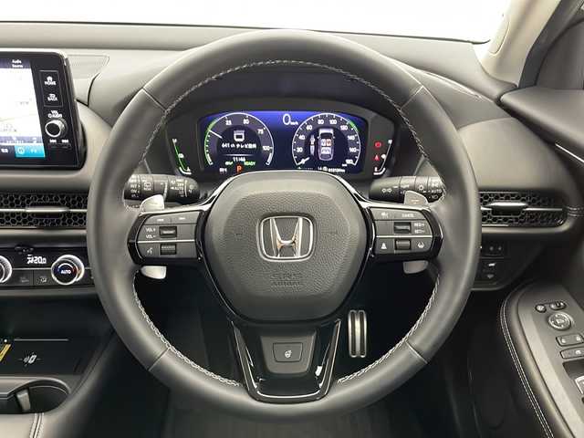 ホンダ ＺＲ－Ｖ ハイブリッド e:HEV Z 長野県 2023(令5)年 1.4万km スーパープラチナグレーメタリック 4WD/ホンダセンシング/純正メモリナビ/Bluetooth/フルセグTV/全方位カメラ/ETC2.0/ステアリングヒーター/パワーシート（運転席、助手席）/シートメモリ/シートヒーター（運転席、助手席）/BOSEサウンド/置くだけ充電/衝突被害軽減システム/踏み間違い衝突被害軽減/レーンキープアシスト/横滑り防止装置/路外逸脱抑制機能/フロントロアスカート/サイドロアスカート/テールゲートスポイラー/ステアリングスイッチ/パドルシフト/純正18インチAW装着/社外フロアマット/ドアバイザー/LEDヘッドライト/前後コーナーセンサー/スマートキー