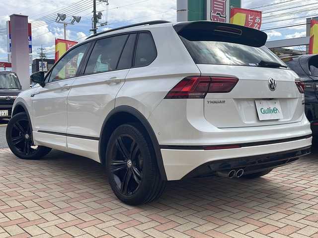 フォルクスワーゲン ティグアン TDI 4モーション Rライン 鳥取県 2020(令2)年 5.1万km オリックスホワイトパールエフェクト ワンオーナー/ディーラー車/オールモード4WD/ハーフレザーシート/スマートキーx２個/パワーテールゲート/バーチャルコックピット/グロスブラック19AW/全方位カメラ/メーカーナビゲーション/プリクラッシュセーフティ/ブラインドスポットモニタリング/レーンデパーチャーアラート/インテリジェントソナー/レーダークルーズコントロール/ドライブレコーダー/LEDヘッドライト/LEDフォグライト/前席シートヒーター/パドルシフト/オーバーヘッドコンソール/フルセグ・Bluetooth/ビルトインETC/保証書・取説