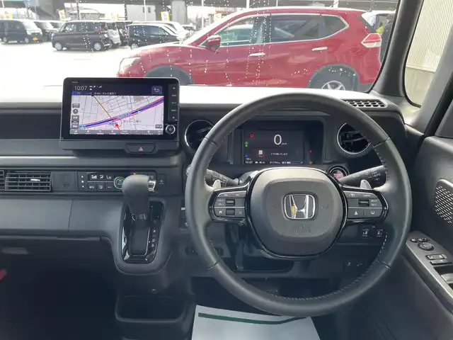 ホンダ Ｎ ＢＯＸ カスタム ターボ 石川県 2024(令6)年 1.2万km パール ターボ/純正9型ナビ/フルセグTV/全方位カメラ/LEDヘッドライト/ETC/両側パワースライド/オートライト/純正アルミホイール/ホンダセンシング/ハーフレザーシート/レーダークルーズ/スマートキー/シートヒーター/プッシュスタート/電動ミラー/オートライト/保証書