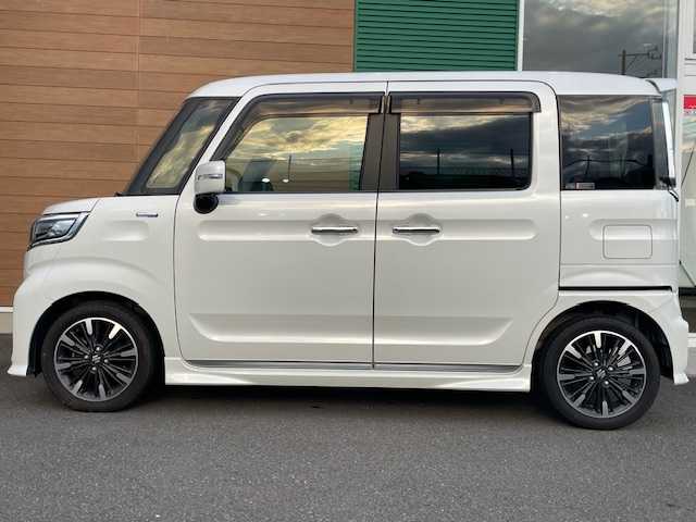 スズキ スペーシア カスタム HYBRID XS ターボ 静岡県 2018(平30)年 5万km ピュアホワイトP 純正ナビCN-RZ83/【CD・ＤＶＤ・フルセグ・ＢＴ・ｉｐｏｄ・USB】/前後ドライブレコーダー/ＥＴＣ/両側パワースライドドア/コーナーセンサー/ヘッドアップディスプレイ/運転席シートヒーター/横滑り防止/アイドリングストップ/ハーフレザーシート/純正フロアマット/純正１５インチAW/オートライト/LEDヘッドライト/スマートキー/プッシュスタート/取扱説明書