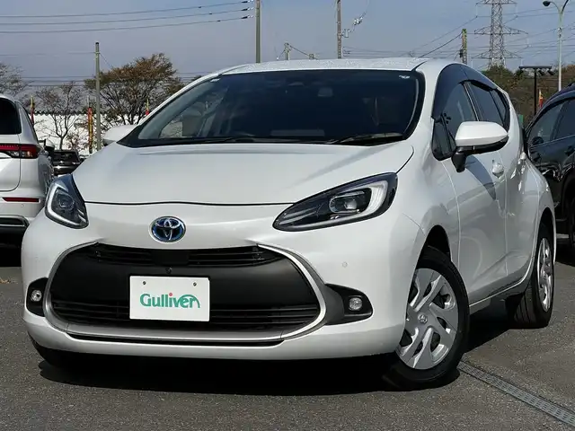 トヨタ アクア G 道央・札幌 2023(令5)年 4.1万km プラチナホワイトパールマイカ ４WD/純正メモリーナビ/AM/FM/BT/コンフォートパッケージ/トヨタセーフティセンス/衝突被害軽減ブレーキ/横滑り防止装置/レーダークルーズコントロール/レーンキープアシスト/クリアランスソナー/ブラインドスポットモニター/バックカメラ/サイドカメラ/フロントカメラ/全方位カメラ/アラウンドビューモニター/ビルトインETC/アイドリングストップ/DRIVEMODE/EVMODE/前席シートヒーター/革巻きステアリング/ステアリングリモコン/ハンドルヒーター/AC100V/プッシュスタート/スマートキー/LEDヘッドライト/オートライト/オートマチックハイビーム/フォグランプ/ヘッドライトレベライザー/電動格納ミラー/ヒーテッドドアミラー/ウィンカーミラー/純正フロアマット/ドアバイザー