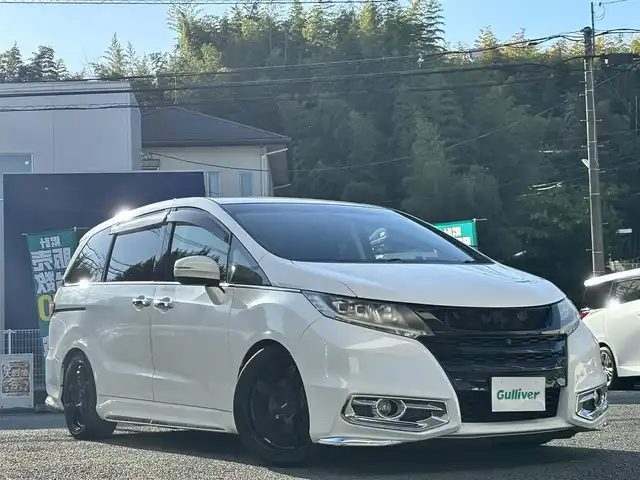 ホンダ オデッセイ アブソルート EX 熊本県 2014(平26)年 10.5万km ホワイトオーキッドパール 純正ナビ/【フルセグTV/Bluetooth/CD/DVD】/全方囲カメラ/バックカメラ/後席用モニター/両側パワースライドドア/クルーズコントロール/パドルシフト/アイドリングストップ/ビルトインETC/HDMI/社外18インチAW【RAYS】/TEIN車高調/電動格納ミラー/プッシュスタート/ステアリングスイッチ/本革巻きステアリング/純正フロアマット/純正ドアバイザー/横滑り防止/盗難防止装置/保証書/取扱説明書