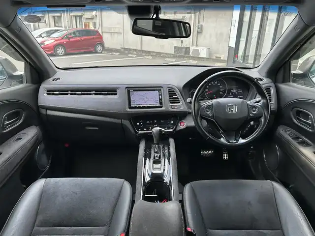 ホンダ ヴェゼル RS ホンダセンシング 佐賀県 2016(平28)年 7.3万km ホワイトオーキッドパール ワンオーナー/ホンダセンシング/レーダークルーズコントロール/純正9インチナビ/・バックカメラ/・フルセグTV/BT/CD/DVD/ハーフレザーシート/シートヒーター/純正18インチAW/革巻きステアリング/パドルシフト/電動パーキングスイッチ/LEDライト/フォグランプ/オートライト/ETC/電動格納ミラー/アイドリングストップ/ドアバイザー/スペアキー×1/取扱説明書/保証書