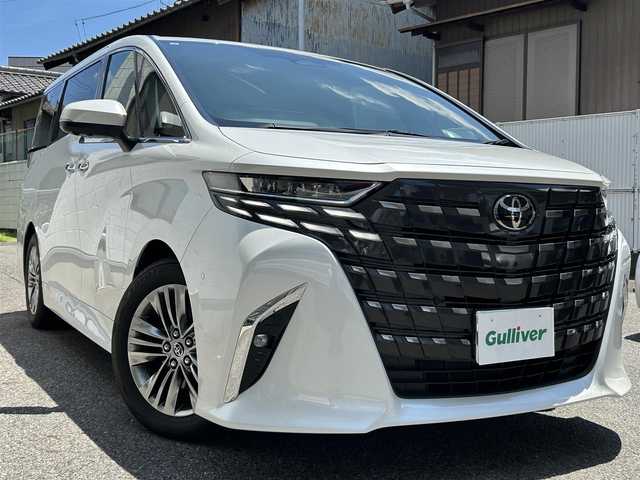 トヨタ アルファードハイブリット Z 愛知県 2023(令5)年 2.8万km プラチナホワイトパールマイカ ワンオーナー/純ディスプレイナビテレビ/純フリップダウンモニター/パノラマビューカメラ/サンルーフ/クロレザーシート/デジタルインナーミラー/ヘッドアップディスプレイ/ワイヤレス充電/前後ドライブレコーダー/ETC2.0/スペアタイヤ/トヨタチームメイト/トヨタセーフティセンス/純18インチAW/新車保証書/スペアキー