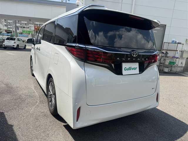 トヨタ アルファードハイブリット Z 愛知県 2023(令5)年 2.8万km プラチナホワイトパールマイカ ワンオーナー/純ディスプレイナビテレビ/純フリップダウンモニター/パノラマビューカメラ/サンルーフ/クロレザーシート/デジタルインナーミラー/ヘッドアップディスプレイ/ワイヤレス充電/前後ドライブレコーダー/ETC2.0/スペアタイヤ/トヨタチームメイト/トヨタセーフティセンス/純18インチAW/新車保証書/スペアキー