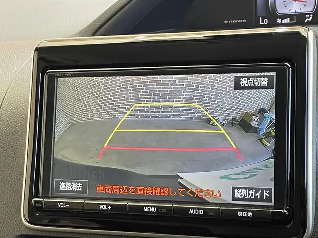 トヨタ ヴォクシー V 岩手県 2017(平29)年 10.5万km ブラッキッシュアゲハガラスフレーク ４WD/両側パワースライドドア/MTモード付きAT/３列シート/プリクラッシュセーフティー/レーンディパーチャーアラート/横滑り防止装置/クルーズコントロール/バックカメラ/オートライト/オートマチックハイビーム/アイドリングストップ/ドライブレコーダー/ETC2.0/フルセグTV/純正ナビ/純正フロアマット/純正アルミホイール15インチ/オールオートウィンドウ