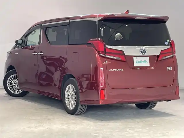 トヨタ アルファードハイブリット SR 宮城県 2019(令1)年 5.1万km ダークレッドマイカメタリック 4WD/ツインムーンルーフ/JBLサウンドシステム/後席モニター/デジタルインナーミラー/トヨタセーフティセンス/・プリクラッシュセーフティ/・レーントレーシングアシスト/・レーダークルーズコントロール/・ロードサインアシスト/・オートマチックハイビーム/純正ナビ/・アラウンドビューモニター/・Bluetooth/CD/・フルセグTV/・USB入力端子/ブラインドスポットモニター/前後コーナーセンサー/リヤクロストラフィックアラート/オートブレーキホールド/電子パーキング/前後ドライブレコーダー/LED2.0/電動リアゲート/革巻きステアリングウッドコンビ/レザーシート/・シートメモリー(運転席)/・シートベンチレーション(運転席・助手席)/・シートヒーター（運転席/助手席）/・オットマン（助手席・2列目）/AC100V充電/LEDヘッドライト/・オートライト/・フォグランプ/純正アルミホイール/純正フロアマット