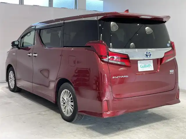 トヨタ アルファードハイブリット SR 宮城県 2019(令1)年 5.1万km ダークレッドマイカメタリック 4WD/ツインムーンルーフ/JBLサウンドシステム/後席モニター/デジタルインナーミラー/トヨタセーフティセンス/・プリクラッシュセーフティ/・レーントレーシングアシスト/・レーダークルーズコントロール/・ロードサインアシスト/・オートマチックハイビーム/純正ナビ/・アラウンドビューモニター/・Bluetooth/CD/・フルセグTV/・USB入力端子/ブラインドスポットモニター/前後コーナーセンサー/リヤクロストラフィックアラート/オートブレーキホールド/電子パーキング/前後ドライブレコーダー/LED2.0/電動リアゲート/革巻きステアリングウッドコンビ/レザーシート/・シートメモリー(運転席)/・シートベンチレーション(運転席・助手席)/・シートヒーター（運転席/助手席）/・オットマン（助手席・2列目）/AC100V充電/LEDヘッドライト/・オートライト/・フォグランプ/純正アルミホイール/純正フロアマット