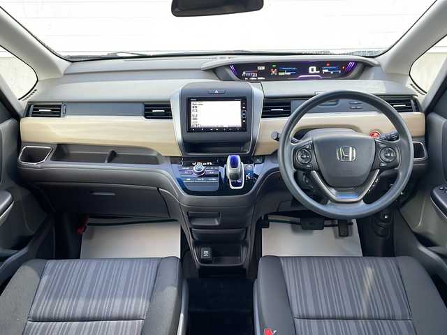 ホンダ フリード ハイブリット G ホンダセンシング 山形県 2018(平30)年 8.6万km ブルーホライゾンM 禁煙車/ホンダセンシング/・衝突軽減ブレーキ（ＣＭＢＳ）/・路外逸脱抑制機能/・先行車発進お知らせ機能/・アダプティブクルーズコントロール（ＡＣＣ）/・レーンキープアシスト（ＬＫＡＳ）/・標識認識機能/車両接近通報装置/両側パワースライドドア/純正ナビ(ＡＭ/FM/TV/BT)/純正ドライブレコーダー/ビルトインＥＴＣ/横滑り防止装置/ワイパーデアイサー