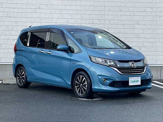 ホンダ フリード ハイブリット G ホンダセンシング 山形県 2018(平30)年 8.6万km ブルーホライゾンM 禁煙車/ホンダセンシング/・衝突軽減ブレーキ（ＣＭＢＳ）/・路外逸脱抑制機能/・先行車発進お知らせ機能/・アダプティブクルーズコントロール（ＡＣＣ）/・レーンキープアシスト（ＬＫＡＳ）/・標識認識機能/車両接近通報装置/両側パワースライドドア/純正ナビ(ＡＭ/FM/TV/BT)/純正ドライブレコーダー/ビルトインＥＴＣ/横滑り防止装置/ワイパーデアイサー