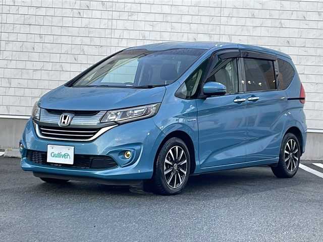 ホンダ フリード ハイブリット G ホンダセンシング 山形県 2018(平30)年 8.6万km ブルーホライゾンM 禁煙車/ホンダセンシング/・衝突軽減ブレーキ（ＣＭＢＳ）/・路外逸脱抑制機能/・先行車発進お知らせ機能/・アダプティブクルーズコントロール（ＡＣＣ）/・レーンキープアシスト（ＬＫＡＳ）/・標識認識機能/車両接近通報装置/両側パワースライドドア/純正ナビ(ＡＭ/FM/TV/BT)/純正ドライブレコーダー/ビルトインＥＴＣ/横滑り防止装置/ワイパーデアイサー