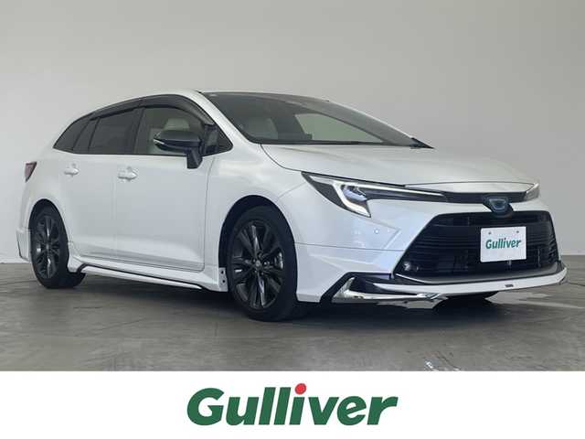 トヨタ カローラツーリング ハイブリッド ダブルバイビー 埼玉県 2023(令5)年 2.6万km プラチナホワイトパールマイカ モデリスタエアロ/Toyota Safety Sense/純正１０．５型ナビ/バックカメラ/地デジＴＶ/ビルトインＥＴＣ２．０/レーダークルーズコントロール/ＢＳＭ/白革レザー/シートヒーター/ステアリングヒーター/純正アルミホイール