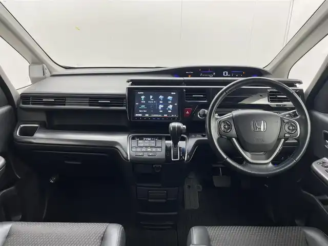 ホンダ ステップワゴン スパーダ クールスピリット 茨城県 2015(平27)年 6万km プレミアムスパークルブラックパール 純正9インチプレミアムインターナビ/Bluetooth/フルセグ/AM/FMCD/DVD/ホンダセンシング/・衝突軽減ブレーキ/・オートクルーズコントロール/・車線逸脱警報/・レーンキープアシスト/・誤発進抑制機能/・先行車発進通知/・標識認識機能/フリップダウンモニター/LEDヘッドライト/オートライト/ハーフレザーシート/シートヒーター/両側パワースライドドア/ステアリングリモコン