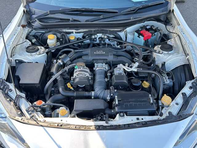 トヨタ ８６ GT 富山県 2013(平25)年 9.7万km サテンホワイトパール 社外ＳＤナビ/（CD/DVD/SD/BT/フルセグＴＶ）/バックカメラ/社外マフラー（ＴＲＤ）/純正１７インチアルミホイール/純正フロアマット/プッシュスタート/ハロゲンヘッドライト/保証書・記録簿/取扱説明書