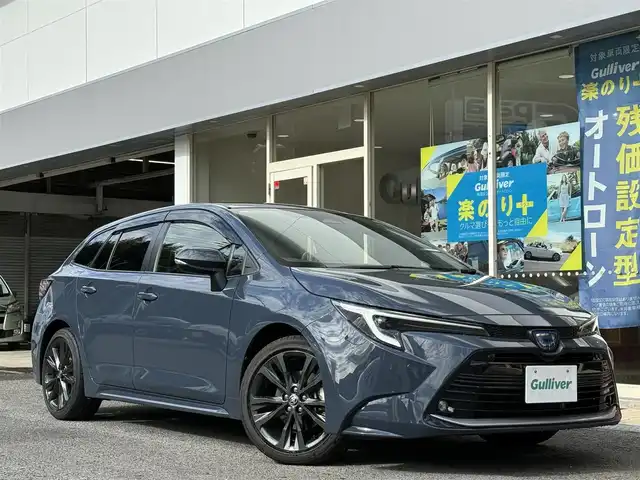 トヨタ カローラツーリング ハイブリッド ダブルバイビー 長崎県 2024(令6)年 1.2万km マッシブグレー トヨタセーフティセンス/・衝突被害軽減ブレーキ/・レーダークルーズコントロール/・オートマチックハイビーム/・レーンキープアシスト/ハーフレザーシート/シートヒーター/メーカーOPナビ/・Bluetooth接続/・フルセグTV/・Miracast/バックカメラ/ビルトインETC2.0/ステアリングスイッチ/ステアリングヒーター/電子パーキング/オートホールド機能/LEDオートヘッドライト/AC100V端子/スマートキー/スペアキー/ISOFIX