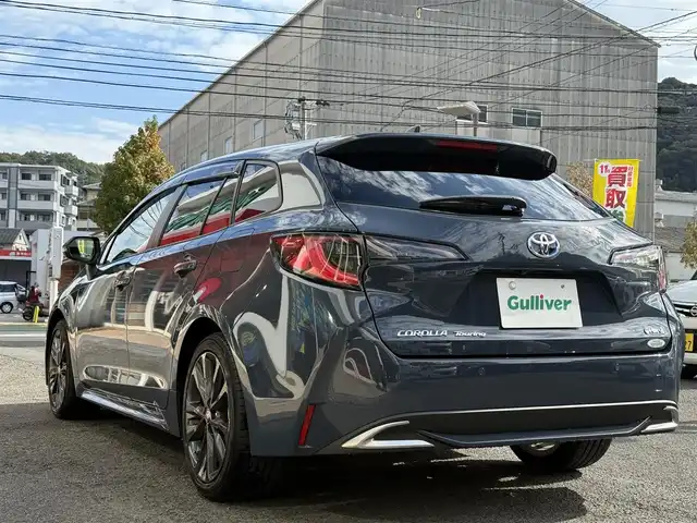 トヨタ カローラツーリング ハイブリッド ダブルバイビー 長崎県 2024(令6)年 1.2万km マッシブグレー トヨタセーフティセンス/・衝突被害軽減ブレーキ/・レーダークルーズコントロール/・オートマチックハイビーム/・レーンキープアシスト/ハーフレザーシート/シートヒーター/メーカーOPナビ/・Bluetooth接続/・フルセグTV/・Miracast/バックカメラ/ビルトインETC2.0/ステアリングスイッチ/ステアリングヒーター/電子パーキング/オートホールド機能/LEDオートヘッドライト/AC100V端子/スマートキー/スペアキー/ISOFIX