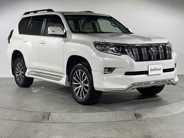 トヨタ ランドクルーザー プラド TX Lパッケージ 福岡県 2021(令3)年 5.2万km ホワイトパールクリスタルシャイン ４WD/Bluetooth接続/MIRACAST/ビルトインETC2.0/フルセグ/追従クルーズコントロール/USB端子/シートヒーター(D+N席)/エアシート(D+N席)/3列シート/AFS/フロントエアロパーツ(モデリスタ)/レーンキープアシスト/ダウンヒルアシストコントロール/スペアキー１本/D席+N席+サイドエアバック/カーテンエアバック