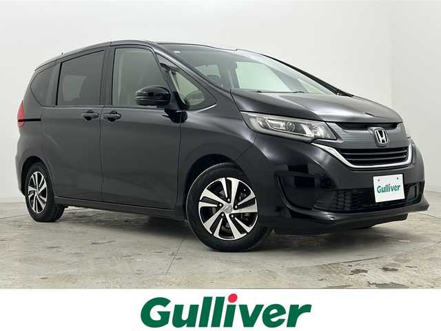 ホンダ フリード G ホンダセンシング 宮城県 2017(平29)年 6.3万km クリスタルブラックパール 禁煙車/ホンダセンシング/・オートクルーズコントロール/・衝突軽減ブレーキ/・車線維持支援システム/・標識認識機能/・先行車発進お知らせ/両側パワースライドドア/純正7インチナビ/（BT.AM.FM.CD.DVD.SD）/バックカメラ/フルセグテレビ/ビルトインETC/革巻きステアリング/ステアリングスイッチ/プッシュスタート/スマートキー/スペアキー/3列シート/ハーフレザーシート/純正フロアマット/ロールサンシェード/純正15インチアルミホイール/LEDヘッドライト/ECON/横滑り防止機能