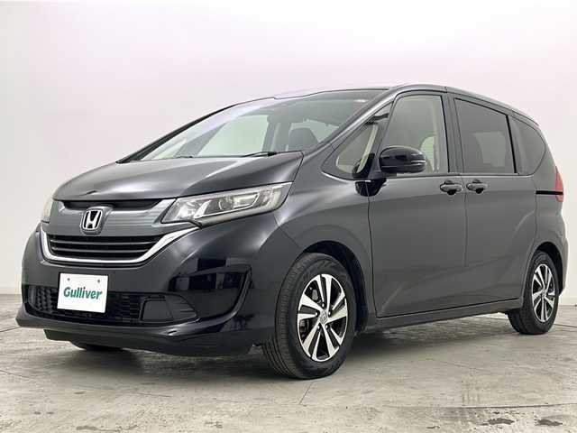 ホンダ フリード G ホンダセンシング 宮城県 2017(平29)年 6.3万km クリスタルブラックパール 禁煙車/ホンダセンシング/・オートクルーズコントロール/・衝突軽減ブレーキ/・車線維持支援システム/・標識認識機能/・先行車発進お知らせ/両側パワースライドドア/純正7インチナビ/（BT.AM.FM.CD.DVD.SD）/バックカメラ/フルセグテレビ/ビルトインETC/革巻きステアリング/ステアリングスイッチ/プッシュスタート/スマートキー/スペアキー/3列シート/ハーフレザーシート/純正フロアマット/ロールサンシェード/純正15インチアルミホイール/LEDヘッドライト/ECON/横滑り防止機能