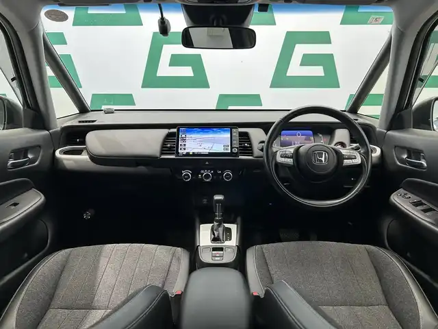 ホンダ フィット e:HEVホーム 鹿児島県 2020(令2)年 2.5万km プラチナホワイトパール 純正ナビ/バックカメラ/ホンダセンシング/渋滞追従機能付きアダプティブクルーズコントロール/衝突軽減ブレーキ/車線維持支援システム/標識認識機能/オートハイビーム/フルセグTV/純正前後ドライブレコーダー/ＥＴＣ/LEDヘッドライト/電動パーキングブレーキ/ブレーキホールド/純正フロアマット/純正アルミ