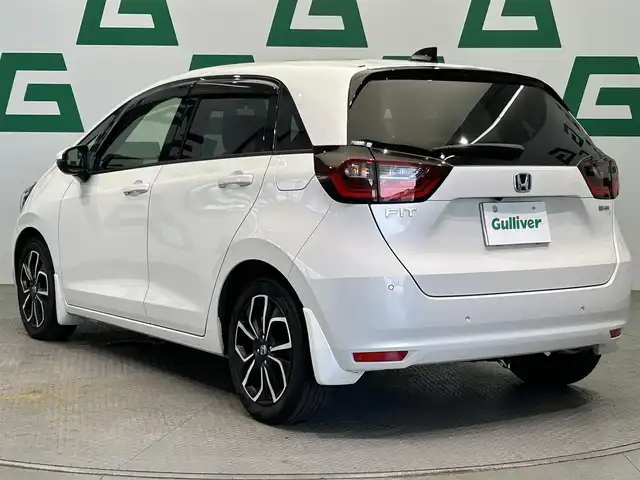 ホンダ フィット e:HEVホーム 鹿児島県 2020(令2)年 2.5万km プラチナホワイトパール 純正ナビ/バックカメラ/ホンダセンシング/渋滞追従機能付きアダプティブクルーズコントロール/衝突軽減ブレーキ/車線維持支援システム/標識認識機能/オートハイビーム/フルセグTV/純正前後ドライブレコーダー/ＥＴＣ/LEDヘッドライト/電動パーキングブレーキ/ブレーキホールド/純正フロアマット/純正アルミ