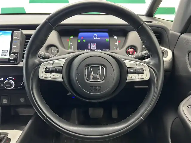 ホンダ フィット e:HEVホーム 鹿児島県 2020(令2)年 2.5万km プラチナホワイトパール 純正ナビ/バックカメラ/ホンダセンシング/渋滞追従機能付きアダプティブクルーズコントロール/衝突軽減ブレーキ/車線維持支援システム/標識認識機能/オートハイビーム/フルセグTV/純正前後ドライブレコーダー/ＥＴＣ/LEDヘッドライト/電動パーキングブレーキ/ブレーキホールド/純正フロアマット/純正アルミ