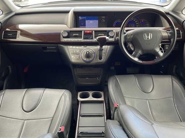 ホンダ エリシオン G Aero 兵庫県 2006(平18)年 7.9万km ブルーイッシュホワイトパール ・純正ナビ＆CD＆MSV/・バックカメラ/・社外フリップダウンモニター/・ETC/・社外18インチアルミホイール/・革巻きステアリング/・オートライト/・純正フロアマット/・左右独立エアコン/・レザー調シートカバー/・ディスチャージヘッドライト/・イモビライザー/・セキュリティアラーム/・電動格納式リモコンカラードドアミラー