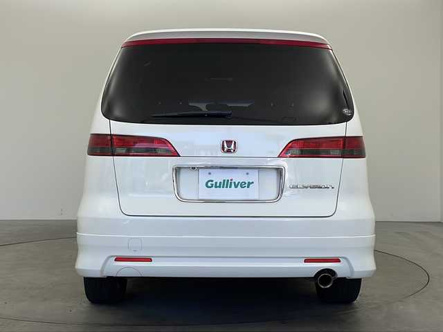 ホンダ エリシオン G Aero 兵庫県 2006(平18)年 7.9万km ブルーイッシュホワイトパール ・純正ナビ＆CD＆MSV/・バックカメラ/・社外フリップダウンモニター/・ETC/・社外18インチアルミホイール/・革巻きステアリング/・オートライト/・純正フロアマット/・左右独立エアコン/・レザー調シートカバー/・ディスチャージヘッドライト/・イモビライザー/・セキュリティアラーム/・電動格納式リモコンカラードドアミラー