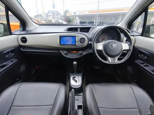 トヨタ ヴィッツ U 熊本県 2012(平24)年 13万km ホワイトパールクリスタルシャイン 4WD/モデリスタエアロ/純正HDDナビ（NHZN-W61G）/【フルセグTV/Bluetooth/CD/DVD】/バックカメラ/ETC/シートヒーター/プッシュスタート/ウインカーミラー/スペアキー/純正フロアマット/社外シートカバー/スペアタイヤ/取扱説明書