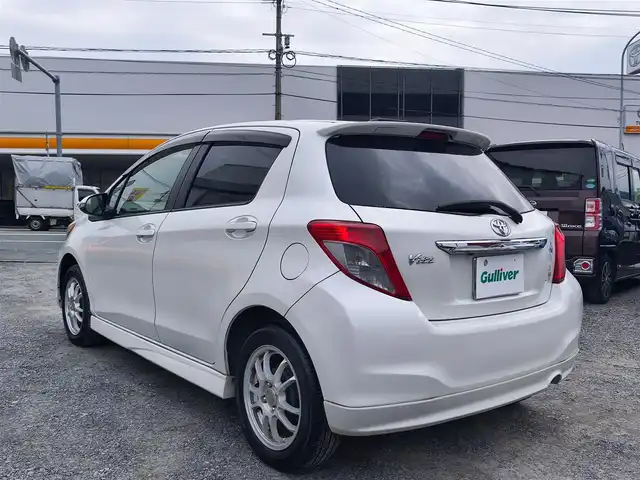 トヨタ ヴィッツ U 熊本県 2012(平24)年 13万km ホワイトパールクリスタルシャイン 4WD/モデリスタエアロ/純正HDDナビ（NHZN-W61G）/【フルセグTV/Bluetooth/CD/DVD】/バックカメラ/ETC/シートヒーター/プッシュスタート/ウインカーミラー/スペアキー/純正フロアマット/社外シートカバー/スペアタイヤ/取扱説明書