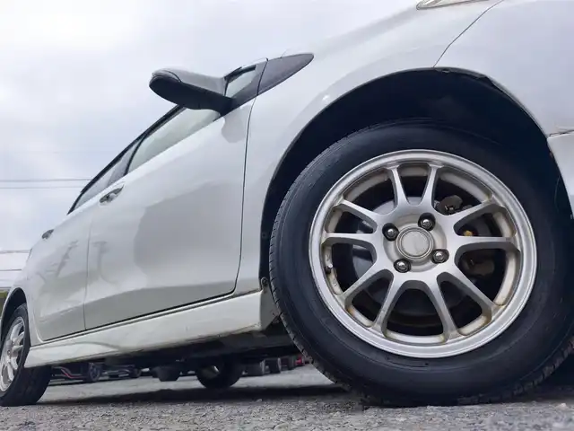 トヨタ ヴィッツ U 熊本県 2012(平24)年 13万km ホワイトパールクリスタルシャイン 4WD/モデリスタエアロ/純正HDDナビ（NHZN-W61G）/【フルセグTV/Bluetooth/CD/DVD】/バックカメラ/ETC/シートヒーター/プッシュスタート/ウインカーミラー/スペアキー/純正フロアマット/社外シートカバー/スペアタイヤ/取扱説明書