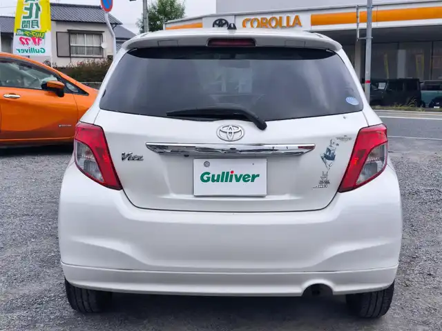 トヨタ ヴィッツ U 熊本県 2012(平24)年 13万km ホワイトパールクリスタルシャイン 4WD/モデリスタエアロ/純正HDDナビ（NHZN-W61G）/【フルセグTV/Bluetooth/CD/DVD】/バックカメラ/ETC/シートヒーター/プッシュスタート/ウインカーミラー/スペアキー/純正フロアマット/社外シートカバー/スペアタイヤ/取扱説明書