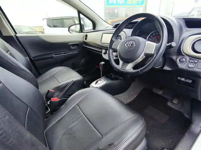 トヨタ ヴィッツ U 熊本県 2012(平24)年 13万km ホワイトパールクリスタルシャイン 4WD/モデリスタエアロ/純正HDDナビ（NHZN-W61G）/【フルセグTV/Bluetooth/CD/DVD】/バックカメラ/ETC/シートヒーター/プッシュスタート/ウインカーミラー/スペアキー/純正フロアマット/社外シートカバー/スペアタイヤ/取扱説明書