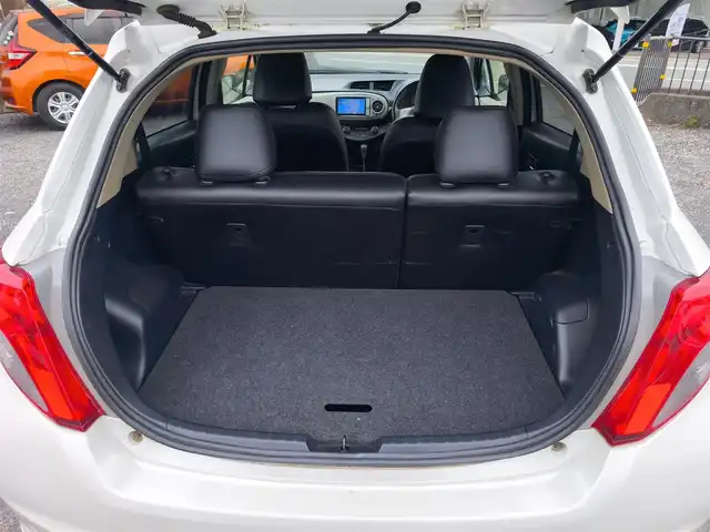 トヨタ ヴィッツ U 熊本県 2012(平24)年 13万km ホワイトパールクリスタルシャイン 4WD/モデリスタエアロ/純正HDDナビ（NHZN-W61G）/【フルセグTV/Bluetooth/CD/DVD】/バックカメラ/ETC/シートヒーター/プッシュスタート/ウインカーミラー/スペアキー/純正フロアマット/社外シートカバー/スペアタイヤ/取扱説明書