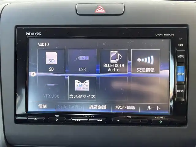 ホンダ フリード G ホンダセンシング 高知県 2017(平29)年 3.3万km ホワイトオーキッドパール 純正ナビ/Bluetooth接続/ETC/バックカメラ/後席用モニター/フルセグテレビ/三列シート/純正フロアマット/純正15インチアルミホイール/両側パワースライドドア/横滑り防止装置/盗難防止装置/衝突被害軽減システム/レーンキープアシスト/オートライト/運転席＋助手席エアバッグ