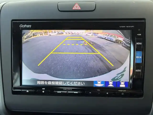 ホンダ フリード G ホンダセンシング 高知県 2017(平29)年 3.3万km ホワイトオーキッドパール 純正ナビ/Bluetooth接続/ETC/バックカメラ/後席用モニター/フルセグテレビ/三列シート/純正フロアマット/純正15インチアルミホイール/両側パワースライドドア/横滑り防止装置/盗難防止装置/衝突被害軽減システム/レーンキープアシスト/オートライト/運転席＋助手席エアバッグ