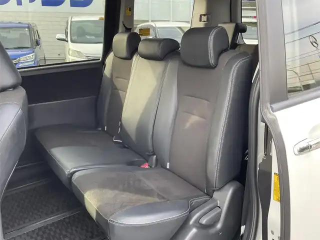 トヨタ ヴォクシー ZS 煌Ⅲ 東京都 2012(平24)年 9.1万km ホワイトパールクリスタルシャイン (株)IDOMが運営する【じしゃロン昭島店】の自社ローン専用車両になります。こちらは現金またはオートローンご利用時の価格です。自社ローンご希望の方は別途その旨お申付け下さい/ディーラーOPナビ/BT、ワンセグTV、SD、DVD/ETC付き/両側パワースライド/ハーフレザーシート/電動格納ミラー/純正フロアマット/キセノンライト