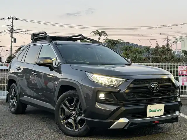 トヨタ ＲＡＶ４ アドベンチャー 静岡県 2022(令4)年 4万km グレーメタリック ~TRD仕様~/ユーザー買取車両/ワンオーナー/純正ディスプレイオーディオ/純正LEDヘッドライト/純正19インチAW/全方位カメラ/レザーシート/シートヒーター/ベンチレーション/プリクラッシュセーフティシステム/レーダークルーズコントロール/TRDルーフキャリア/TRDマッドガード/ステアリングヒーター/パワーバックドア/ビルトインETC/D席パワーシート/デジタルインナーミラー/電動パーキングブレーキ/オートホールド/新車時保証書/取扱説明書/スペアキー×1