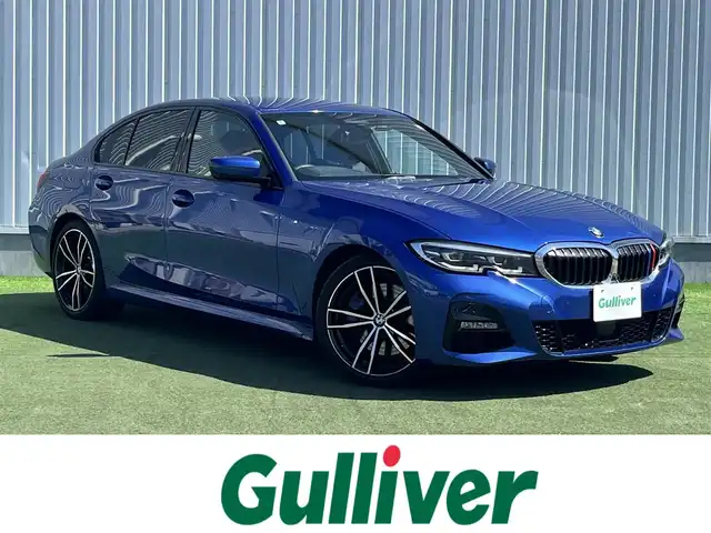 ＢＭＷ ３２０ｉ Mスポーツ 香川県 2020(令2)年 1.3万km 青 登録時走行距離：12339km/メーカー純正ナビ/　バック/全方位カメラ/レーダークルーズコントロール/レーンキープアシスト/横滑り防止装置/アイドリングストップ/プッシュスタート/コーナーセンサー/電子パーキングブレーキ/運転席助手席パワーシート/運転席助手席シートヒーター/ETC/前方ドライブレコーダー/置くだけ充電/革巻きステアリング/ステアリングスイッチ/パドルシフト/オートライト/LEDヘッドライト/オートライト/フォグランプ/リアフォグ/電動格納ウィンカーミラー