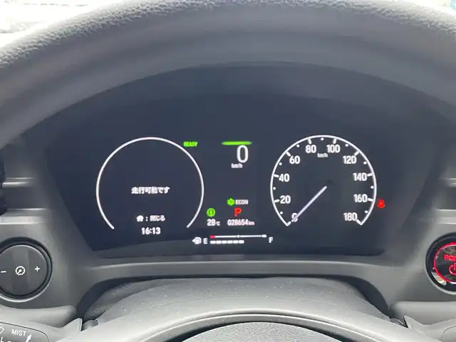ホンダ ヴェゼル ハイブリッド e:HEV X 和歌山県 2022(令4)年 2.9万km クリスタルブラックパール 純正9インチナビ（VXUー２２５VZi)/フルセグTV/（BT/CD/DVD/AM/FM/USB)/バックカメラ/横滑り防止/衝突被害軽減ブレーキ/レーンキープアシスト/レーダークルーズコントロール/前後コーナーセンサー/オートライト/ビルトインETC/パドルシフト/RAYS18インチアルミ/電動パーキング/ブレーキホールド/レザー調シートカバー/LEｄヘッドライト/フォグランプ/ヘッドライトレベライザー/プッシュスタート/ドアバイザー
