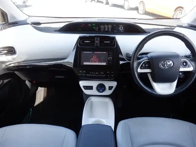 トヨタ プリウス A プレミアム　ツーリングセレ 静岡県 2016(平28)年 7.7万km エモーショナルレッド  ワンオーナー(保証書あり)/ 純正SDナビ(NSZT-W66T)/ バックカメラ/ ヘッドアップディスプレイ/ スマートキー/ プッシュスタート/ レザーシート/ 前席シートヒーター/ 運転席パワーシート/ ビルトインETC/ 前方ドライブレコーダー/ 純正17インチアルミ/ LEDヘッドライト/ フォグランプ/ 純正フロアマット/ ドアバイザー