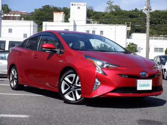 トヨタ プリウス A プレミアム　ツーリングセレ 静岡県 2016(平28)年 7.7万km エモーショナルレッド  ワンオーナー(保証書あり)/ 純正SDナビ(NSZT-W66T)/ バックカメラ/ ヘッドアップディスプレイ/ スマートキー/ プッシュスタート/ レザーシート/ 前席シートヒーター/ 運転席パワーシート/ ビルトインETC/ 前方ドライブレコーダー/ 純正17インチアルミ/ LEDヘッドライト/ フォグランプ/ 純正フロアマット/ ドアバイザー