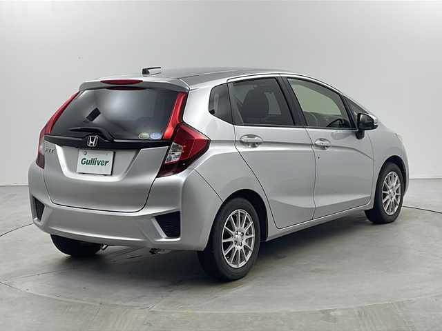 ホンダ フィット 13G Fパッケージ 栃木県 2015(平27)年 7.6万km アラバスターシルバーメタリック ストラーダSDナビ　/・CD　フルセグTV　BT　/バックカメラ　/ETC　/前方ドライブレコーダー　/プッシュスタート　/電動格納ミラー　/純正マット　/オートエアコン/純正キャップ付きサマータイヤ４本（6mm）/　