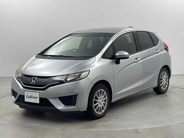 ホンダ フィット 13G Fパッケージ 栃木県 2015(平27)年 7.6万km アラバスターシルバーメタリック ストラーダSDナビ　/・CD　フルセグTV　BT　/バックカメラ　/ETC　/前方ドライブレコーダー　/プッシュスタート　/電動格納ミラー　/純正マット　/オートエアコン/純正キャップ付きサマータイヤ４本（6mm）/　