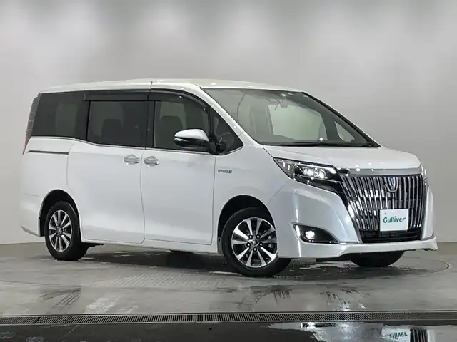 トヨタ エスクァイア ハイブリッド Gi 栃木県 2019(令1)年 3.4万km ホワイトパールクリスタルシャイン 純正ナビ/(CD/DVD/フルセグTV/Bluetooth/SD)/バックカメラ/トヨタセーフティーセンス/・衝突軽減ブレーキ/・車線逸脱警報/・オートマチックハイビーム/・先行車発進お知らせ機能/コーナーセンサー/両側パワ-スライドドア/ハーフレザーシート/シートヒーター/オートライト/LEDヘッドライト/横滑り防止装置/AC100V電源/フォグランプ/スマートキー/プッシュスタート/ステアリングスイッチ/革巻きステアリング/電動格納ミラー/純正15インチアルミホイール/純正フロアマット