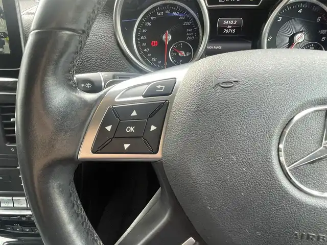 メルセデス・ベンツ ゲレンデヴァーゲン Ｇ３５０ｄ 熊本県 2017(平29)年 7.7万km パープル サンルーフ/革シート/harman/kardon/純正ナビ/（CD・DVD・フルセグTV・BTオーディオ・SD）/バックカメラ/純正18インチAW/クルーズコントロール/パドルシフト/サイドステップ/背面タイヤハードカバー/前席パワーシート・シートメモリー/前席シートヒーター/HIDヘッドライト/オートライト/前後コーナーセンサー/横滑り防止装置/ウィンカーミラー/フロアマット/新車保証書/取扱説明書/スペアキー×1本