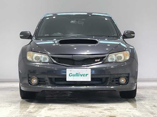 スバル インプレッサ ＷＲＸ STI A－Line 宮城県 2009(平21)年 10.7万km ダークグレーメタリック ターボ/大型ブレーキキャリパー/社外マフラー/社外ブーストメーター/社外ナビ/バックカメラ/フルセグTV/Bluetooth/CD/DVD/パワーシート/シートヒーター/クルーズコントロール/パドルシフト/スマートキー/プッシュスタートボタン