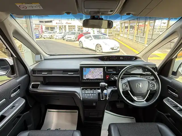 ホンダ ステップワゴン スパーダ クールスピリット 香川県 2016(平28)年 5.1万km ホワイトオーキッドパール 純正SDナビ/【フルセグ/CD/DVD/BT】/バックカメラ/ホンダセンシング/・アダプティブクルーズコントロール/・衝突軽減ブレーキ/・路外逸脱抑制機能/フリップダウンモニター/両側パワースライドドア/ハーフレザーシート/シートバックテーブル/LEDヘッドライト/純正17インチアルミ/純正フロアマット/純正ビルトインETC